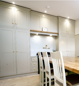 White larder cupboards neatly tucked away